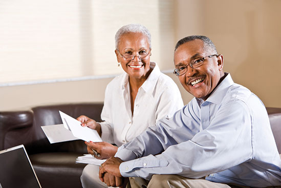 Couple working on their estate planning. Link to What to Give